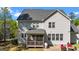 Back of house with screened in porch and outdoor seating area at 3308 Eden Grove Rd, Fuquay Varina, NC 27526