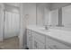 Bathroom with white vanity, sink, mirror and tile flooring with shower and toilet visible at 3308 Eden Grove Rd, Fuquay Varina, NC 27526