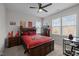 A cozy bedroom features a full bed, ceiling fan, and plenty of natural light at 3308 Eden Grove Rd, Fuquay Varina, NC 27526