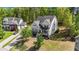 Charming home featuring a stone-accented front, inviting porch, and a well-manicured lawn at 3308 Eden Grove Rd, Fuquay Varina, NC 27526