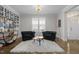 Cozy living room with bright light, elegant furniture, and unique decor at 3308 Eden Grove Rd, Fuquay Varina, NC 27526