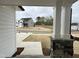 Front porch view showcasing the neighborhood homes and a meticulously landscaped yard at 4408 Emeline Way # 34, Fuquay Varina, NC 27526