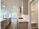 Open concept kitchen with stainless steel appliances and seamless flow to the living area at 4408 Emeline Way # 34, Fuquay Varina, NC 27526
