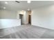 Open loft area showcasing neutral carpeting and versatile living space at 4408 Emeline Way # 34, Fuquay Varina, NC 27526