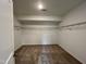 Walk-in closet with ample storage featuring shelving and a plush carpet for comfort at 4408 Emeline Way # 34, Fuquay Varina, NC 27526