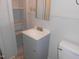 Bathroom with vanity, sink, and toilet at 512 E Branch St, Spring Hope, NC 27882