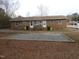 Brick duplex with gravel parking area at 512 E Branch St, Spring Hope, NC 27882