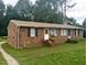 Brick duplex with two units, each with its own entrance and steps at 512 E Branch St, Spring Hope, NC 27882