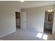 Bright bedroom features 2 door openings at 54 Cultivator Ct, Angier, NC 27501