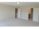 Spacious bedroom with large doors to walk-in closets at 54 Cultivator Ct, Angier, NC 27501