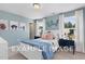 Charming bedroom with white bed frame and light blue walls at 54 Cultivator Ct, Angier, NC 27501