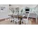 Dining area with view of living room and fireplace at 54 Cultivator Ct, Angier, NC 27501