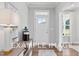 Bright and spacious entryway with hardwood floors and stylish decor at 54 Cultivator Ct, Angier, NC 27501