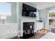 Modern fireplace with built-in shelving at 54 Cultivator Ct, Angier, NC 27501