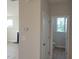 Hallway view showcasing access to a half bathroom at 54 Cultivator Ct, Angier, NC 27501