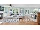 Open living and dining area with hardwood floors and fireplace at 54 Cultivator Ct, Angier, NC 27501