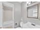 Bright bathroom featuring a vanity sink, mirror, and bathtub at 704 Sunnybrook Rd, Raleigh, NC 27610