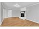 Cozy living room featuring a fireplace and ample space at 704 Sunnybrook Rd, Raleigh, NC 27610