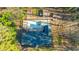 Aerial view of house with pool and deck at 72 Beverly Dr, Durham, NC 27707