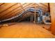 Unfinished attic featuring wooden beams and ductwork offers potential for extra storage or additional living space at 72 Beverly Dr, Durham, NC 27707