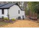 Exterior view of home showing siding, deck, and newly landscaped yard at 72 Beverly Dr, Durham, NC 27707