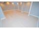 Open finished basement space with neutral walls and walkout access to the pool and backyard for easy fun at 72 Beverly Dr, Durham, NC 27707