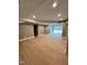 Finished basement features recessed lighting and hardwood floors at 72 Beverly Dr, Durham, NC 27707