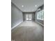 Bright basement with hardwood floors and backyard access at 72 Beverly Dr, Durham, NC 27707