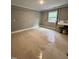 Finished basement laundry room with sink at 72 Beverly Dr, Durham, NC 27707
