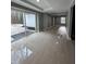 Finished basement with sliding glass doors leading outside at 72 Beverly Dr, Durham, NC 27707