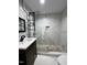 Modern bathroom with marble shower and sleek vanity at 72 Beverly Dr, Durham, NC 27707