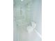 Bright bathroom showcasing a glass shower, white tile, and modern fixtures at 72 Beverly Dr, Durham, NC 27707
