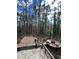 Multi-level deck overlooking a wooded backyard at 72 Beverly Dr, Durham, NC 27707