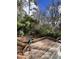 Modern deck overlooks a wooded backyard at 72 Beverly Dr, Durham, NC 27707