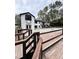 Back of house, showing deck, pool, and wooded area at 72 Beverly Dr, Durham, NC 27707