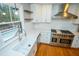 Beautiful kitchen features quartz countertops, stainless appliances, and a large stainless steel range at 72 Beverly Dr, Durham, NC 27707