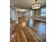 Spacious living area with hardwood floors and large windows at 72 Beverly Dr, Durham, NC 27707