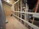 This attic features wood beams, insulation, and is a great space for extra storage needs at 82 N Stagecoach Dr, Wendell, NC 27591
