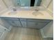 Bathroom vanity with double sinks, quartz countertop, and soft-close gray cabinetry at 82 N Stagecoach Dr, Wendell, NC 27591