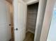 Storage closet with shelving and a view of the bathroom at 82 N Stagecoach Dr, Wendell, NC 27591