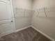 Walk-in closet with white wire shelving at 82 N Stagecoach Dr, Wendell, NC 27591
