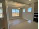 Elegant dining room bathed in natural light, highlighting the open layout and modern design at 82 N Stagecoach Dr, Wendell, NC 27591