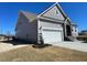 Charming single-Gathering home with stone accents and a two-car garage at 82 N Stagecoach Dr, Wendell, NC 27591