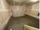 Spacious garage with an automatic garage door at 82 N Stagecoach Dr, Wendell, NC 27591