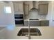 Kitchen island with a stainless steel faucet at 82 N Stagecoach Dr, Wendell, NC 27591