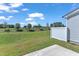 Spacious backyard with a patio and a view of green fields at 8947 Kennebec Crossing Dr # 53, Angier, NC 27501