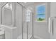 Clean bathroom with a large walk-in shower and a window offering an outdoor view at 8947 Kennebec Crossing Dr # 53, Angier, NC 27501