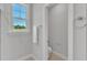 Small half bathroom with toilet and window at 8947 Kennebec Crossing Dr # 53, Angier, NC 27501