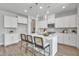 Modern kitchen with white cabinets, quartz countertops, and stainless steel appliances at 8947 Kennebec Crossing Dr # 53, Angier, NC 27501