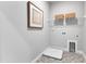 Laundry room with shelving, drain, and patterned floor at 8947 Kennebec Crossing Dr # 53, Angier, NC 27501